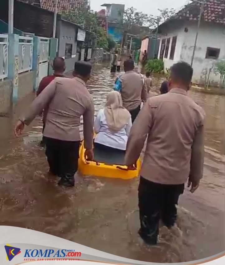 Tanggap Bencana Polres Pasuruan Dan BPBD Tangani Banjir di Winongan
